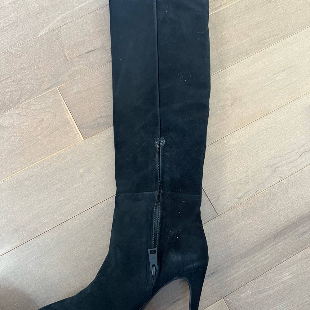 Black suede boots.  Talk about knee height.  Heel height 3.75”.  Never worn.